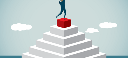 Using the hierarchy of improvement for success Man atop a pyramid